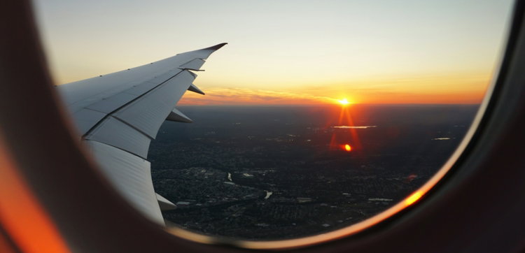 airplanes-window-view-of-sky-during-golden-hour.jpg airplanes window view of sky during golden hour
